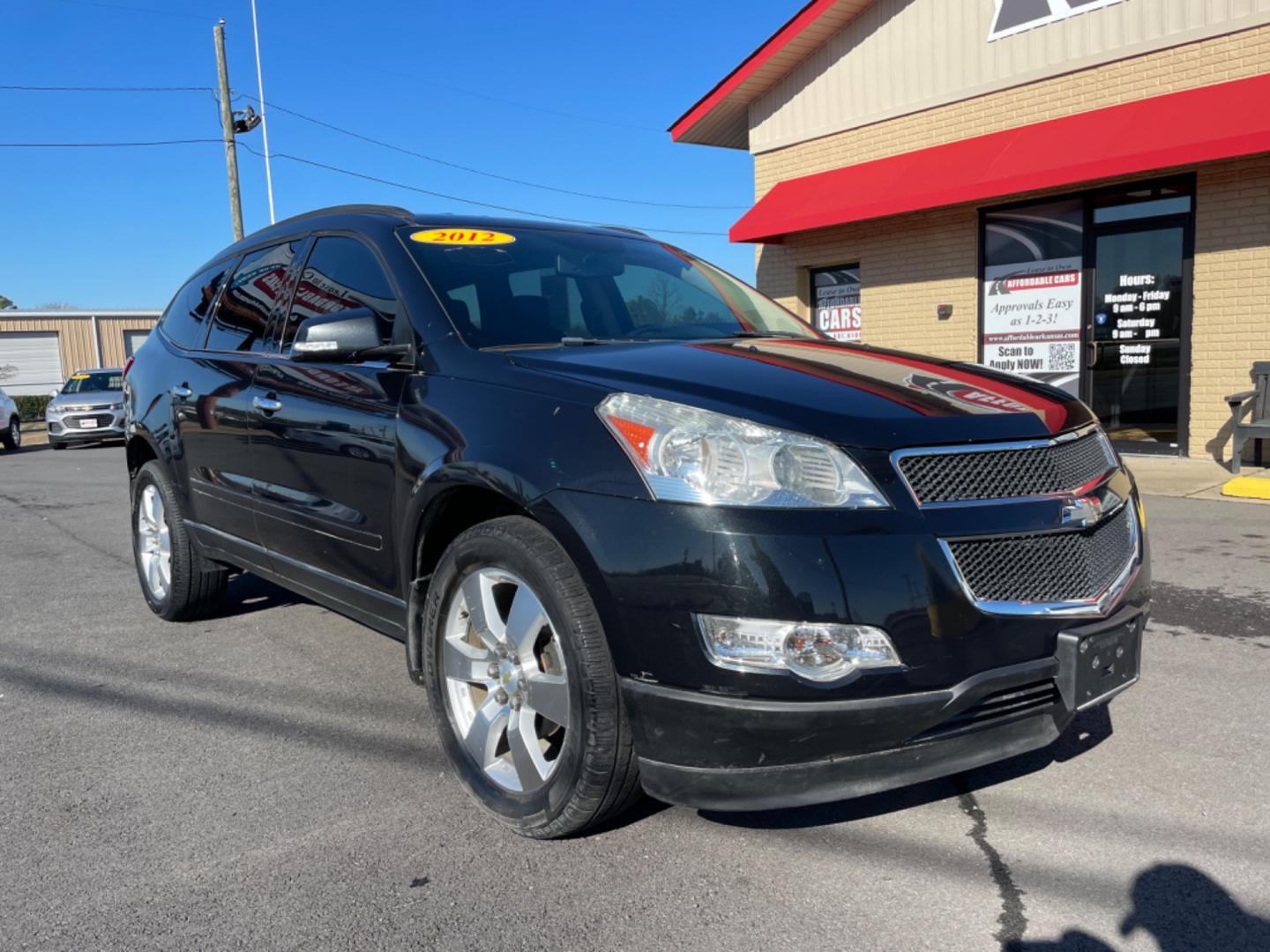 2012 Black Chevrolet Traverse (1GNKRGED7CJ) with an V6, 3.6 Liter engine, Auto, 6-Spd w/Shft Ctrl transmission, located at 8008 Warden Rd, Sherwood, AR, 72120, (501) 801-6100, 34.830078, -92.186684 - Photo#1